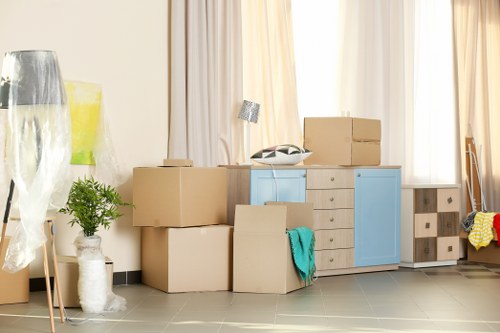 Removal team planning a house move on an Islington residential street