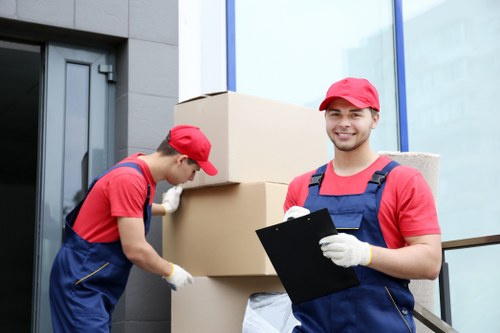 Man and van moving furniture on a residential street in Islington