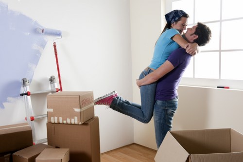 Movers handling stairs and access challenges in an Islington property