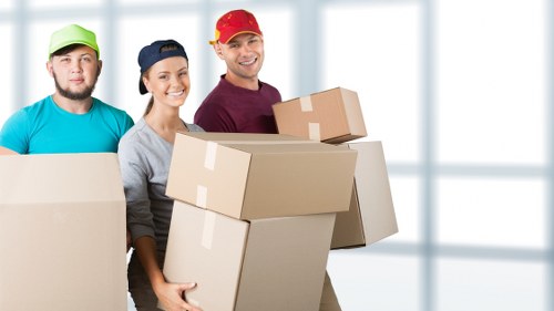 Packed boxes and furniture ready for a local house move in Islington