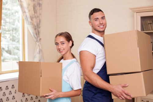 Removal van and packed boxes for a local move in Islington